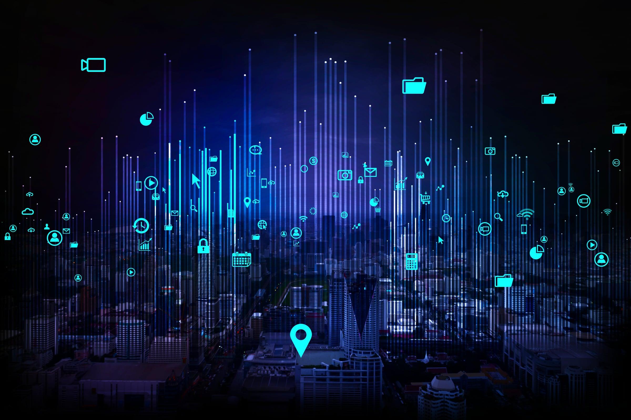 City skyline at night with network connection overlay